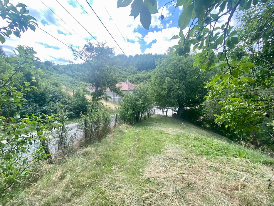 Land with a house in a scenic location.