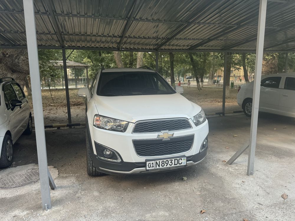 Captiva 3,  148 000 км белая