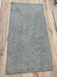 Covor turquoise cu fir lung