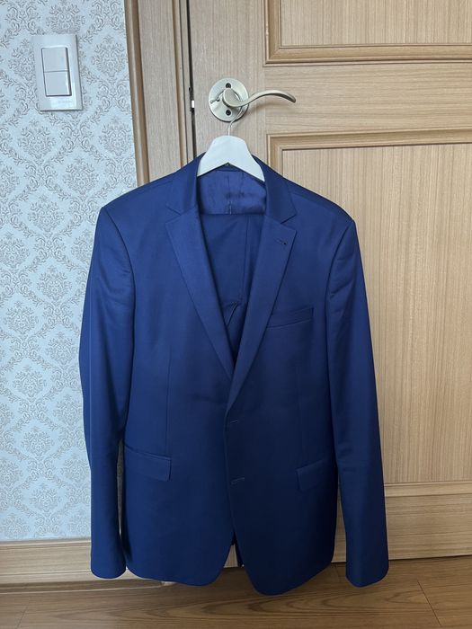 Продам костюм 48 размера