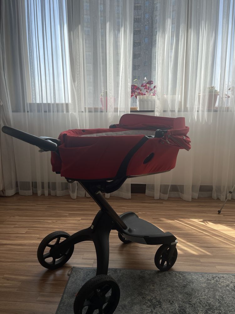 Коляска stokke