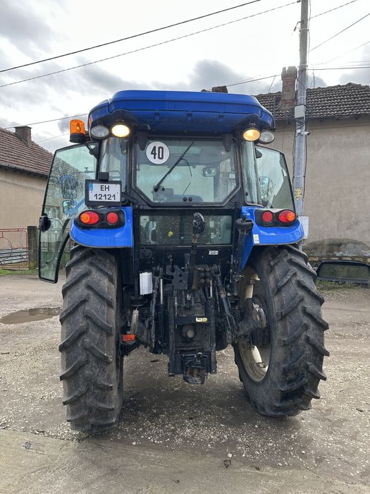 Трактор New Holland TD5.95 с плуг Madara