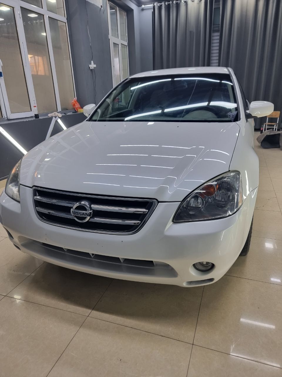 Nissan altima 2007 yil benzin gaz