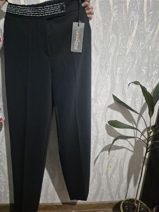 Продам брюки новые