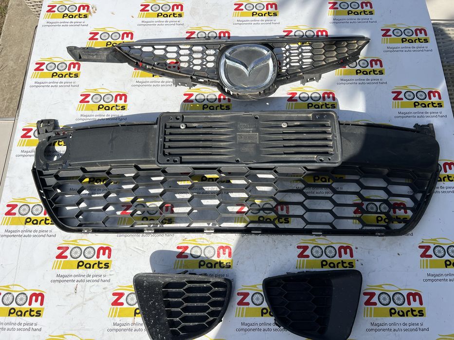 Grila centrala in bara fata Mazda 2 DE 2008-2013