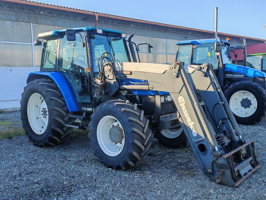 Tractor New Holland Tl 100 cu încărcător frontal quicke q 56