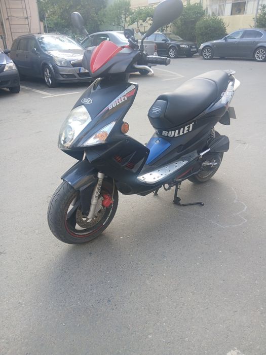 Motoscuter 49--. 2 timpi.