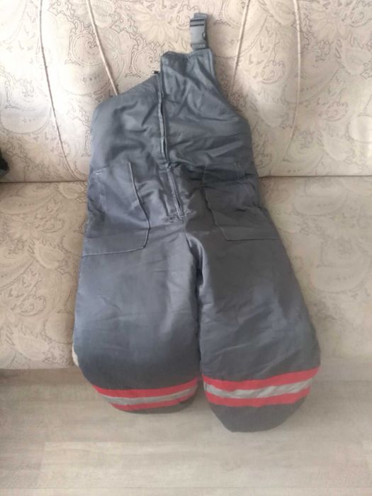 Продам зимний комбинезон новый размер 56.