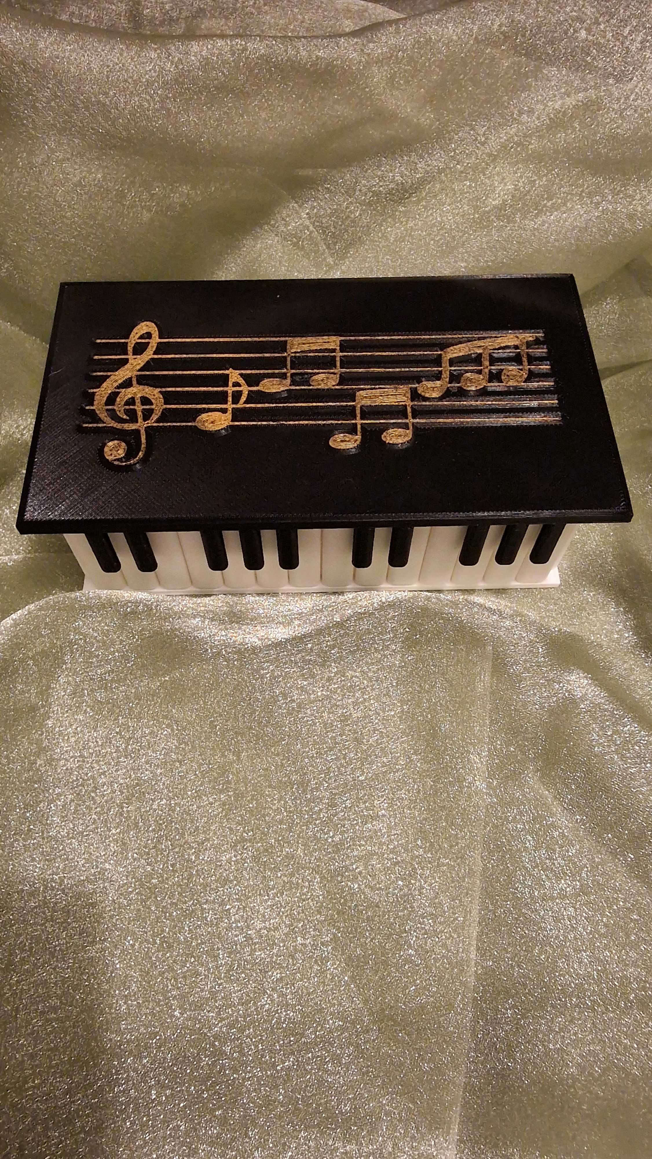 Cutie bijuterii clape pian note muzicale.