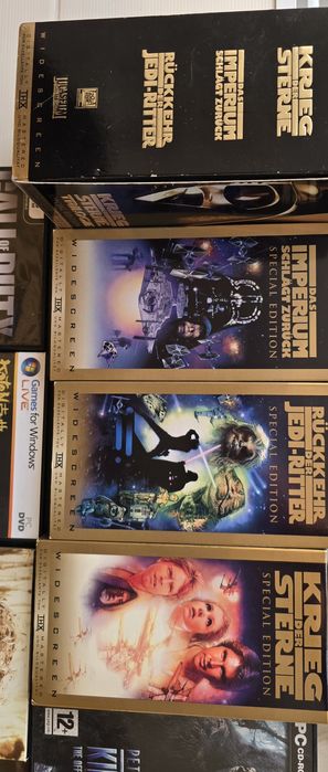 Set 3 casete vhs , 6 dvd steelbox, 5 jocuri pc ,