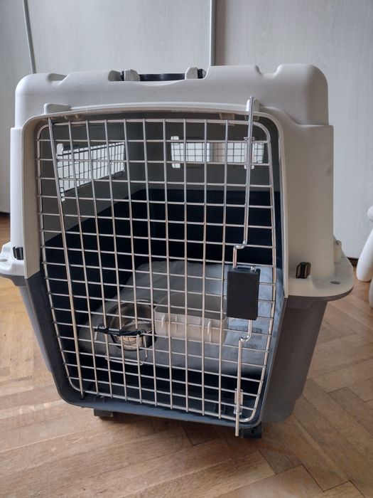 Транспортна клетка за куче на колелца