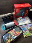 Nintendo Switch с калъф и 4 игри