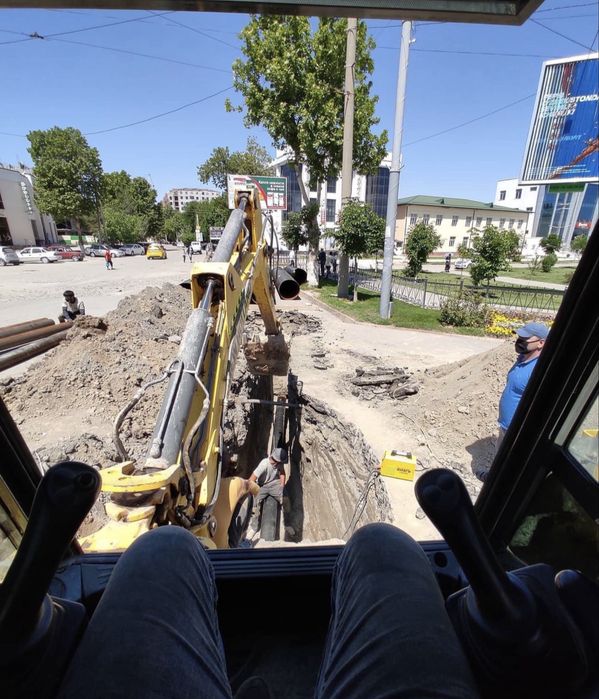 Услуги экскаватора погрузчика