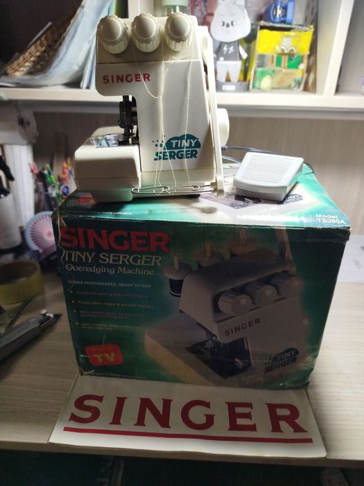 Оверлок  б/у SINGER