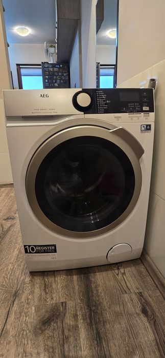Пералня със сушилня AEG L7WBE69S