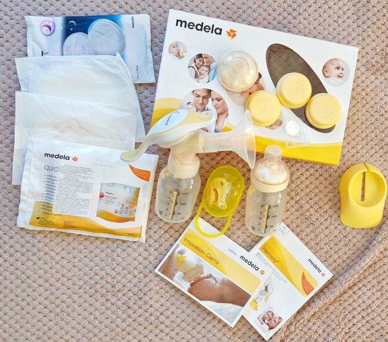 Ръчна помп за кърма Medela Harmoni с биберони Calma и подаръци