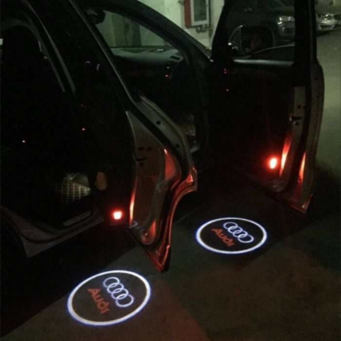 Proiectoare logo portiera cu orice marca ! VW BMW Audi Opel Dacia
