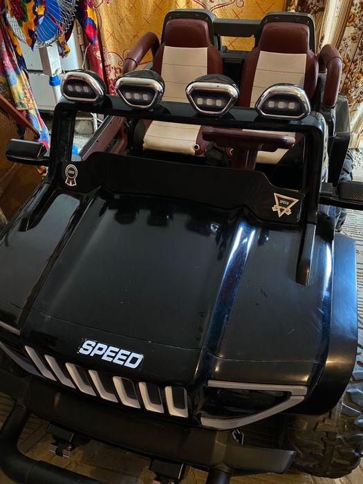 Детская электромашина с пультом управления