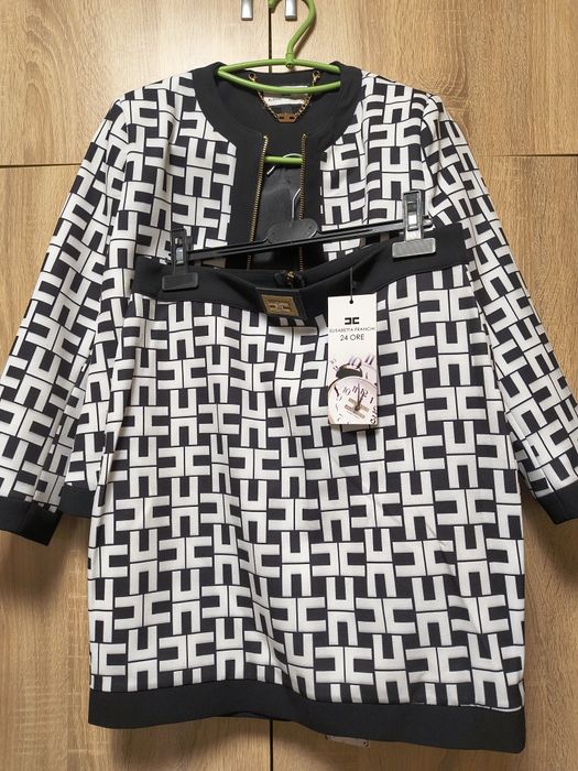 Елегантен дамски костюм