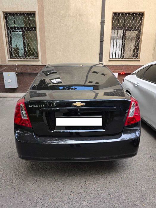 Продается Chevrolet Gentra AT. Чёрный Full позиция