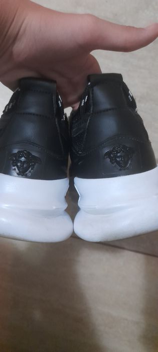 Versace chain reaction