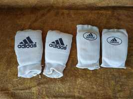 Защитные накладки (щитки) на руки для занятия боевыми искусствами.