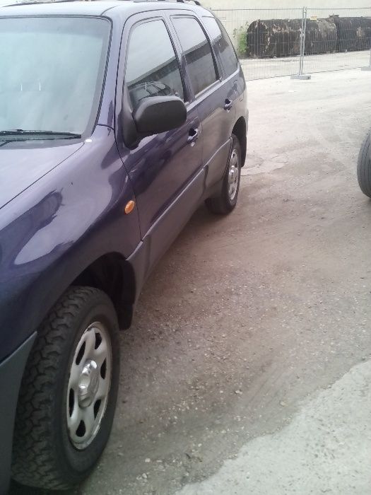 Mazda Tribute 2,0 I 124к.с