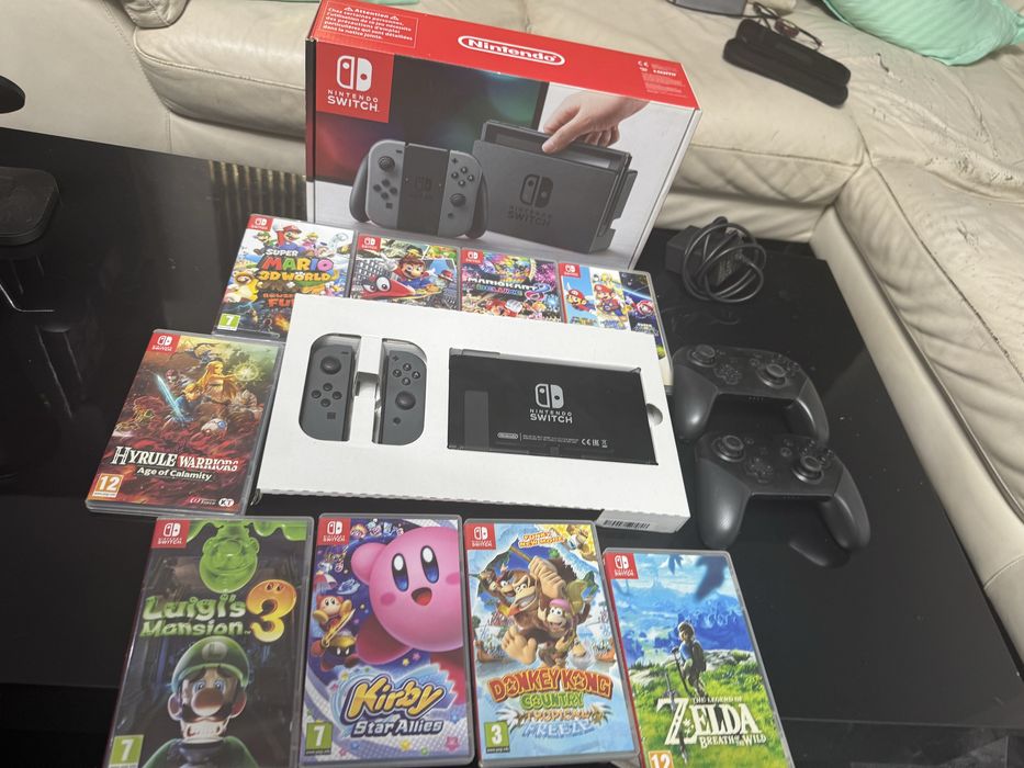 Pachet nintendo switch + 9 jocuri + 2 controlere in stare excelenta