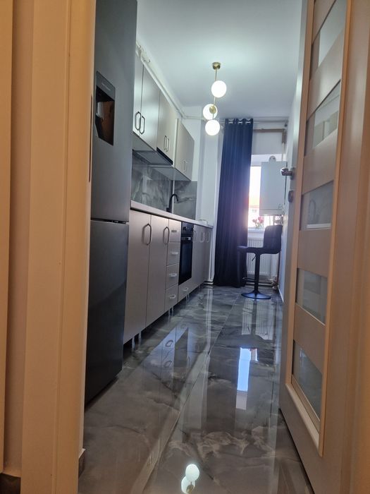 Închiriez garsoniera confort 1