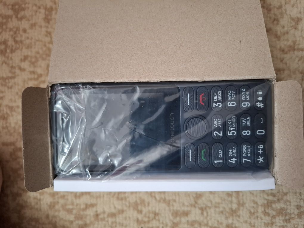 Телефон с копчета TCL