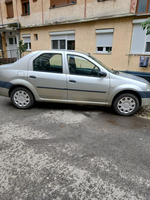 Ford focus 2 sau Dacia Logan