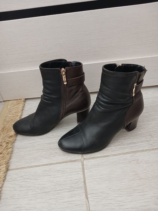 Продам сапоги зимние с каблуком