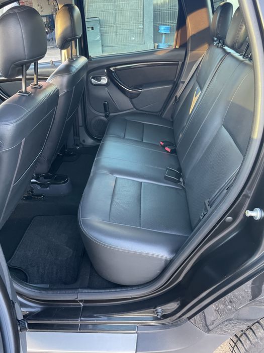 Dacia Duster benzina 1.6 110 cai tractiune 4x4 model prestige