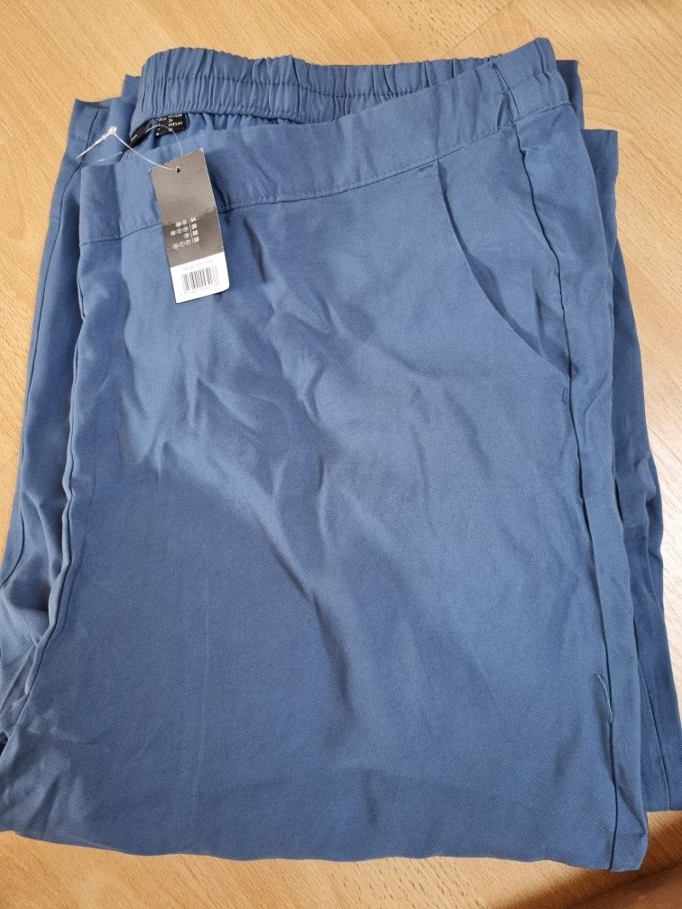 Pantaloni 3/4 damă mărimi mari 52, 54 albastru și negru