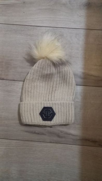 Caciula mot blana naturala 
Pret stoc 95 lei
Curier 25 lei