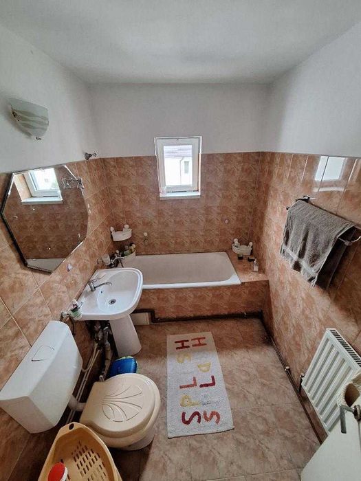 3 camere cu 2 bai,2 balcoane,centrala termica