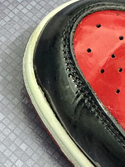 Jordan 1 High Patent Bred purtati