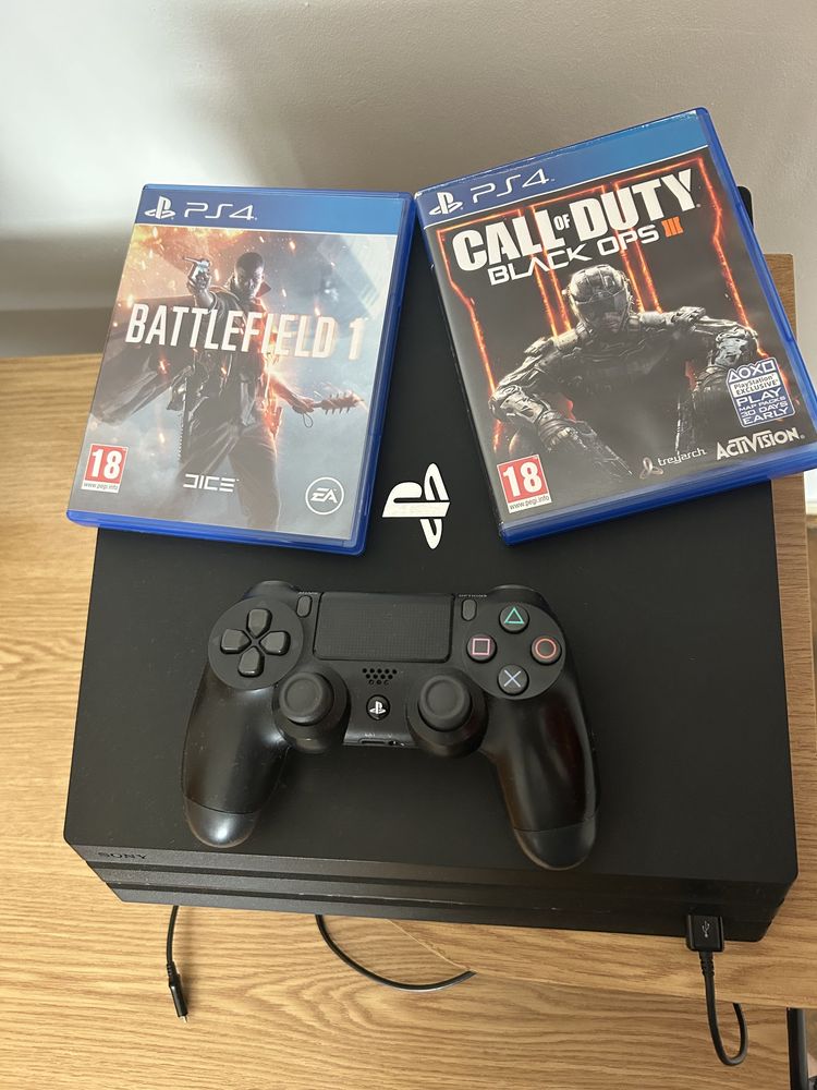 Vând playstation 4 pro 1TB , controller si 2 jocuri fifa 2020 si 2024