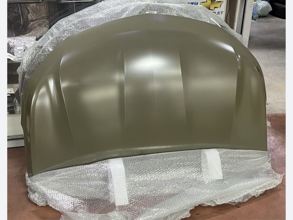 Оригинальный не крашенный капот Chevrolet Onix