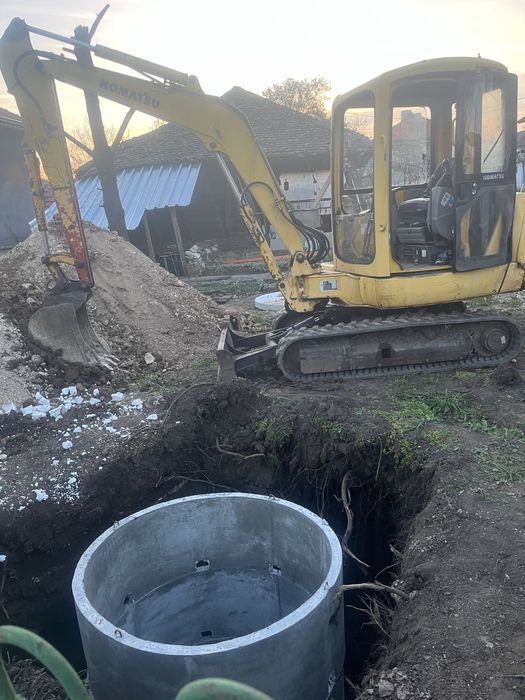 Багер и самосвал с кран