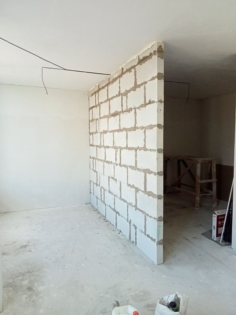 Кладка газоблока стен и меж комнатных перегородок