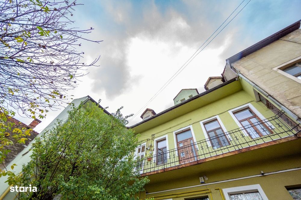 Schimb 4 camere in centrul Brasovului cu 2 camere + diferenta