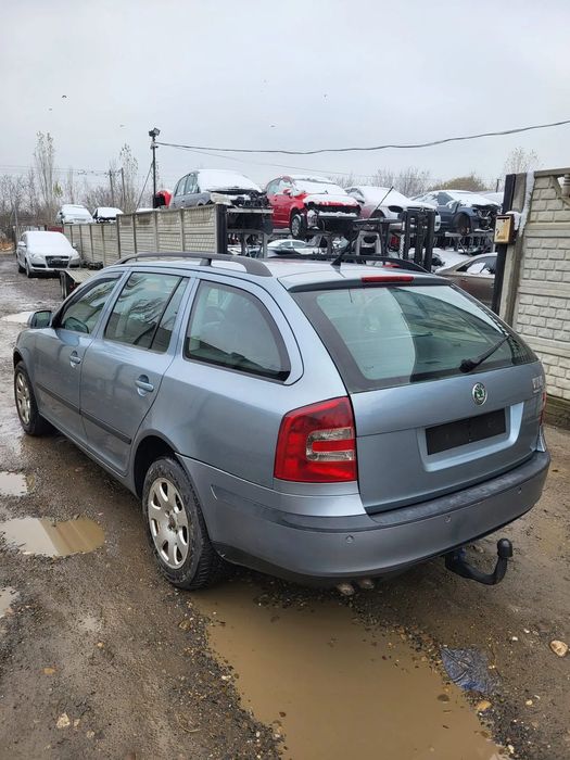 Usa fata stanga/ Usa fata dreapta/ Portiera Fata dreapta/Motor/Injectoare/ Portiera spate dreapta Skoda Octavia 2 break