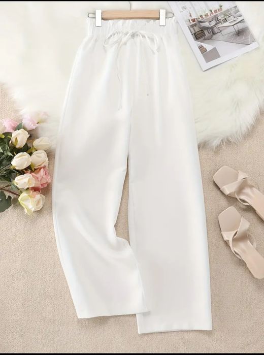 Продам белые брюки