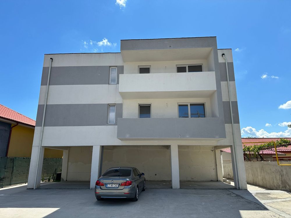 apartament 74 mp utili 2 camere cu balcon etaj 1 zona cet
