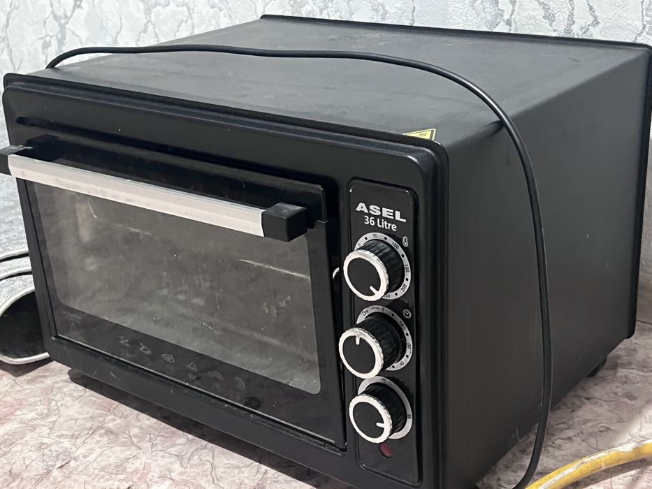 Продам духовку. Цена 15000.