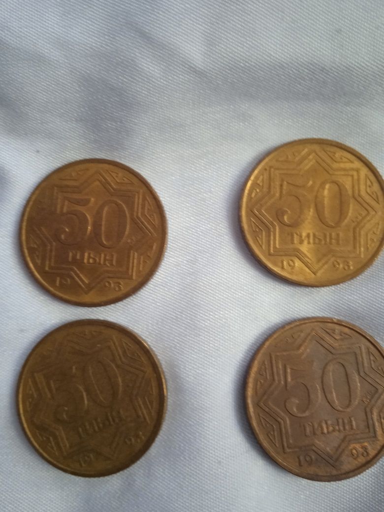 Монеты - тиыны и 1 копейка