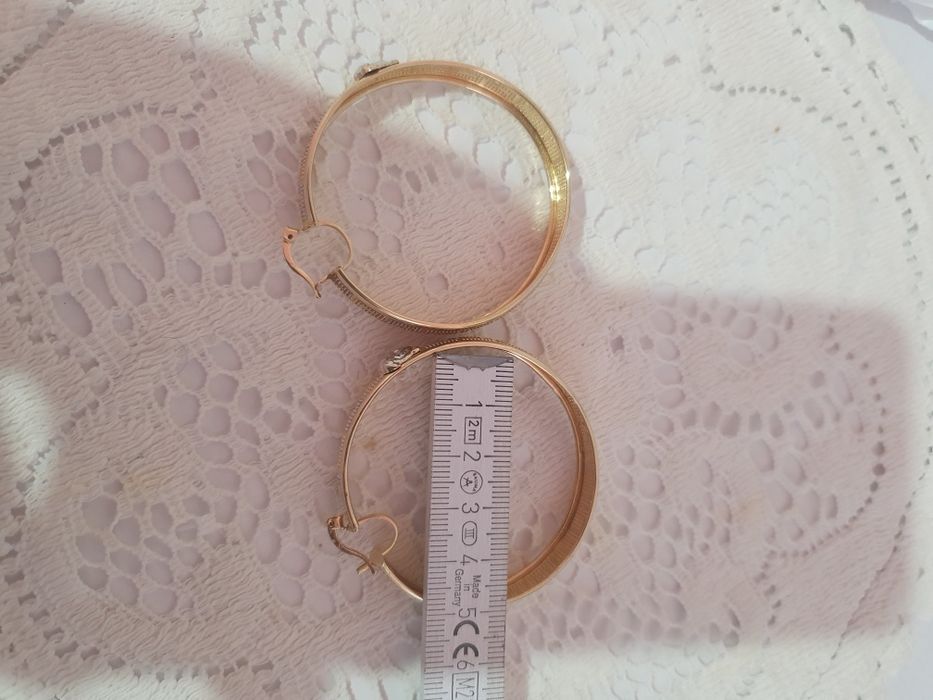 Cercei  aur 14 K Versace model foarte frumos cu aur alb .
