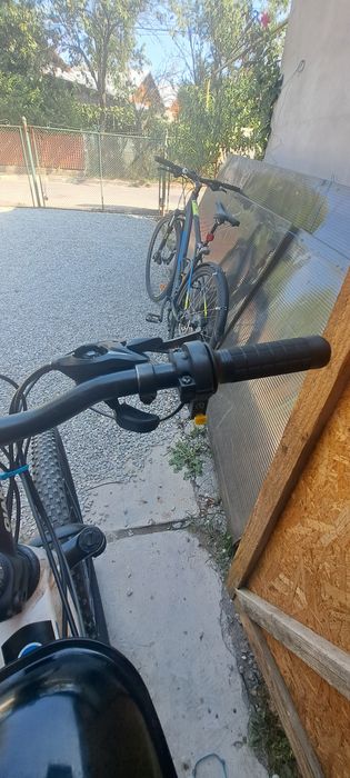Vind bicicleta cu motor