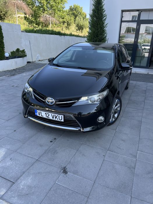 Toyota Auris Hybrid impecabila